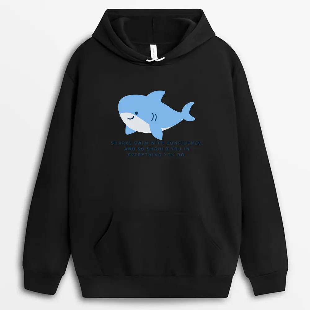 Side view of a black printed hoodie with a sleek shark illustration gliding across the torso, designed to express silent strength and resilience in motion.