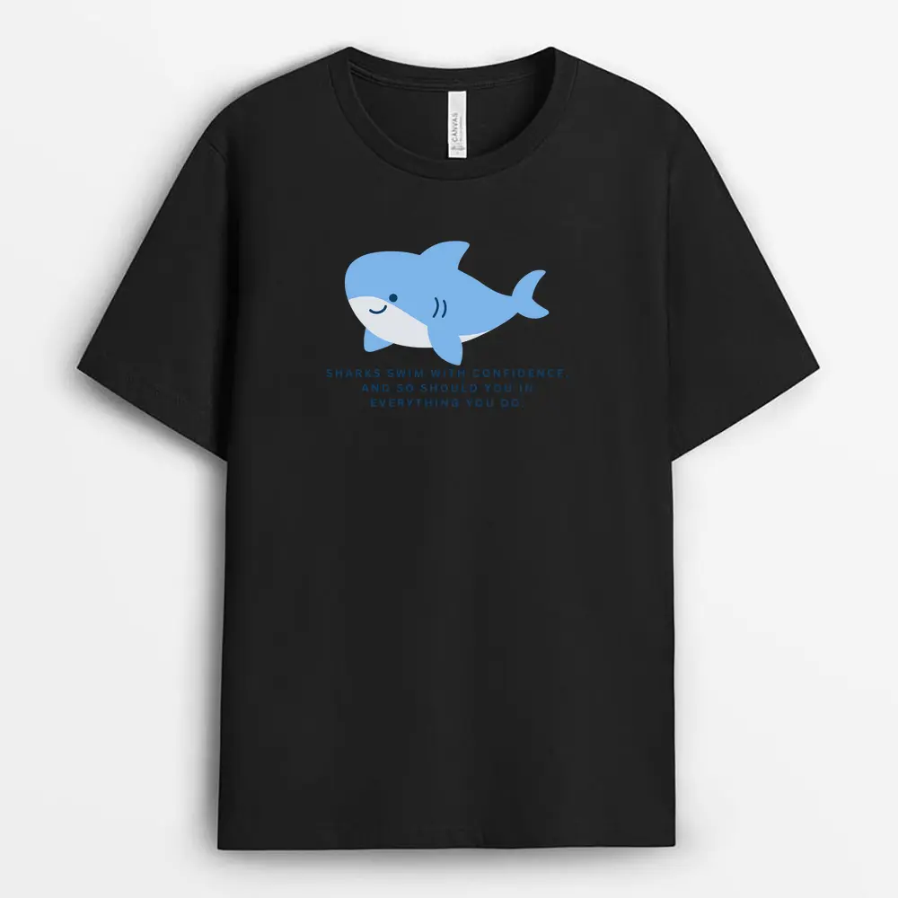 Close-up of a white custom T-shirt featuring a bold shark graphic on the chest, symbolizing confidence and forward momentum. The fabric appears soft and breathable with a natural shoulder drape.