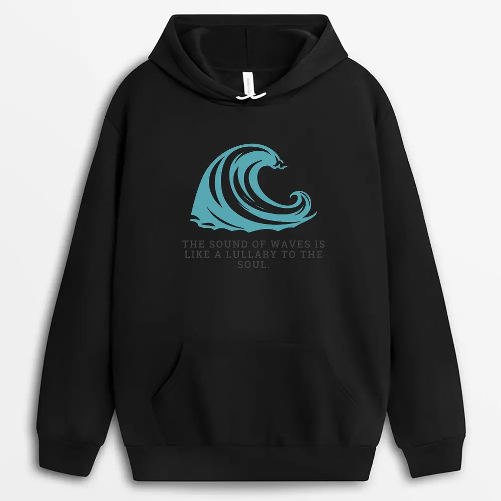 Close-up of a teal hoodie with watercolor-style ocean print on the chest, brushed inner lining peeking from the hood, styled for comfort and emotional healing.